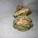 Само очарование. Обожаю подобные штучки. Все мечтаю слепить сама. Спасибо, Лена, за очаровашку!!!!